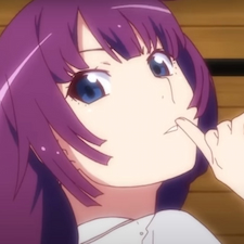 Hitagi holding her finger to her lip