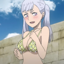 Noelle in her bikini top blushing