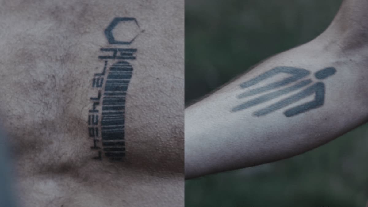 Arvel Skeens tattoos: a barcode and a hand shape