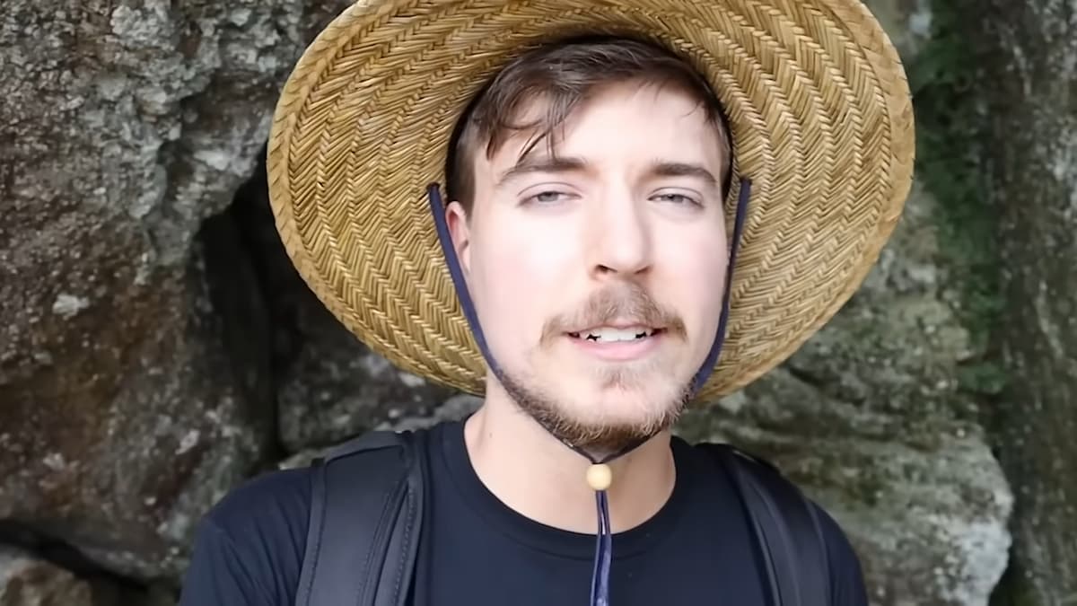 MrBeast climbing a mountain