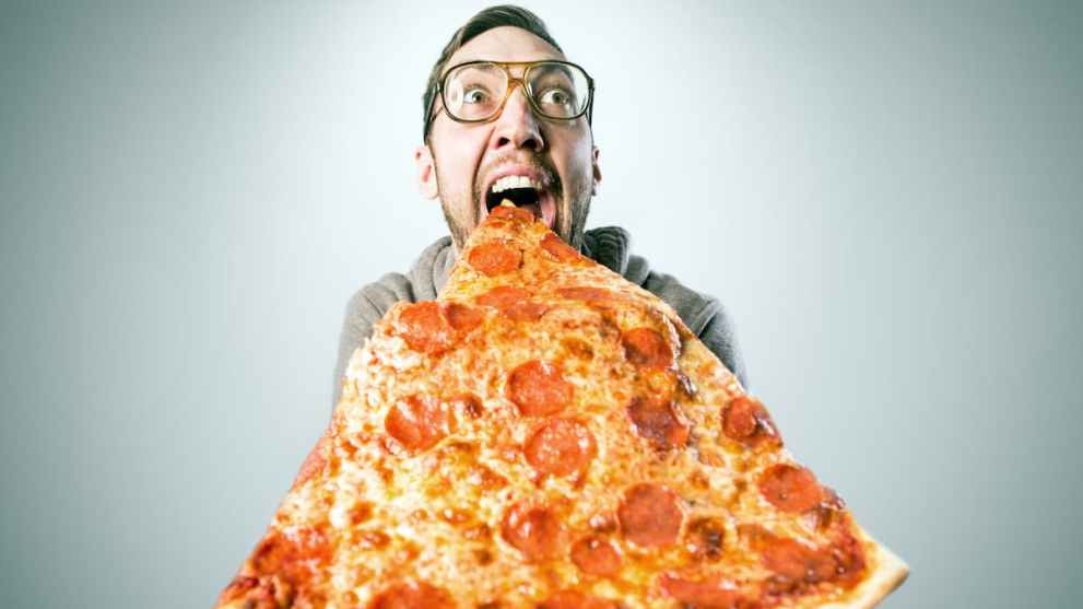 Man eating pizza